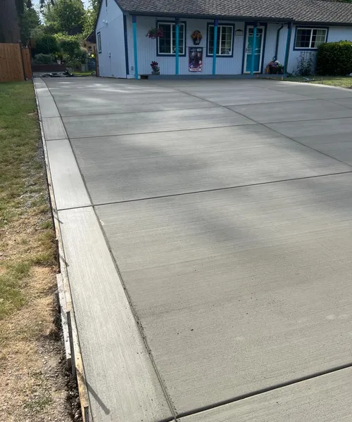 Broom finish driveway and decorate borders in Federal Way 